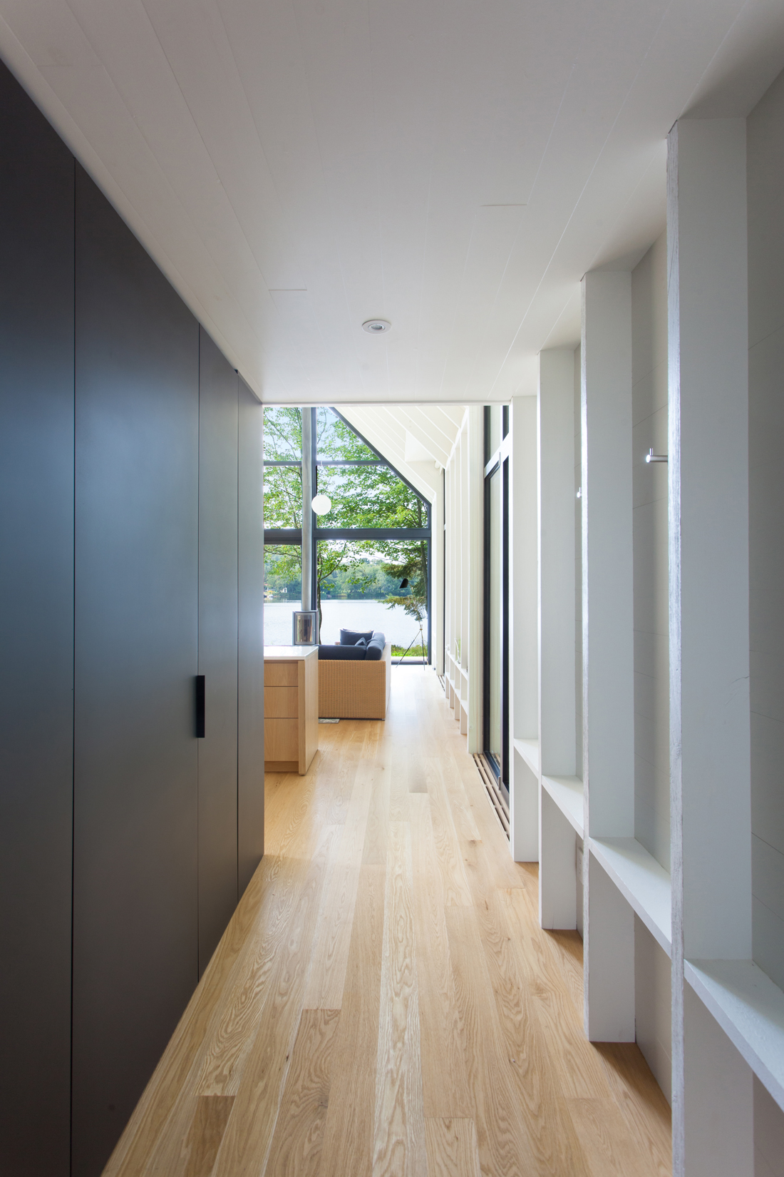 Storage Lined Hallway Design by YH2 architects | DPAGES