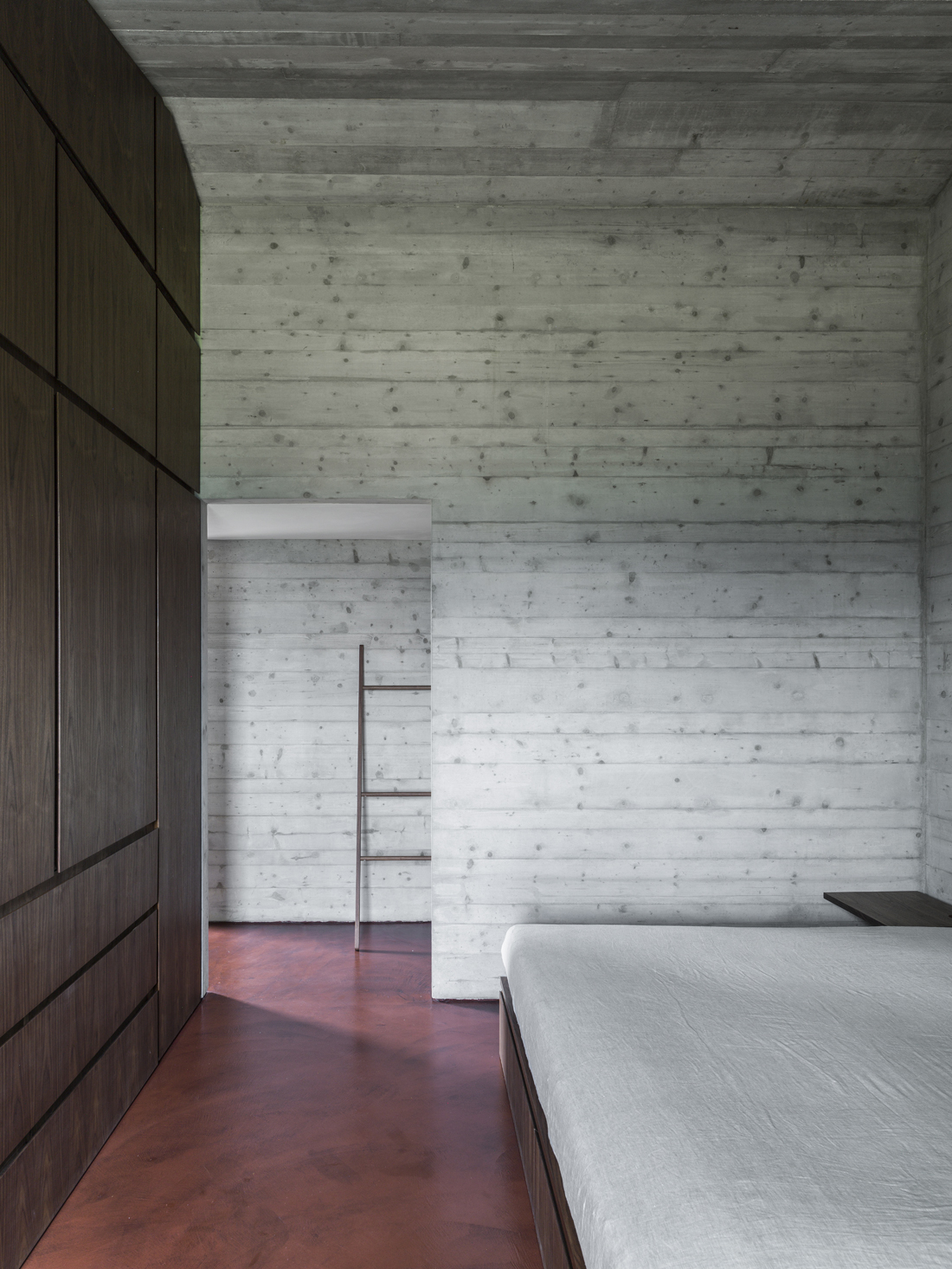 Bedroom with Cement Walls by GGA Architetti | DPAGES