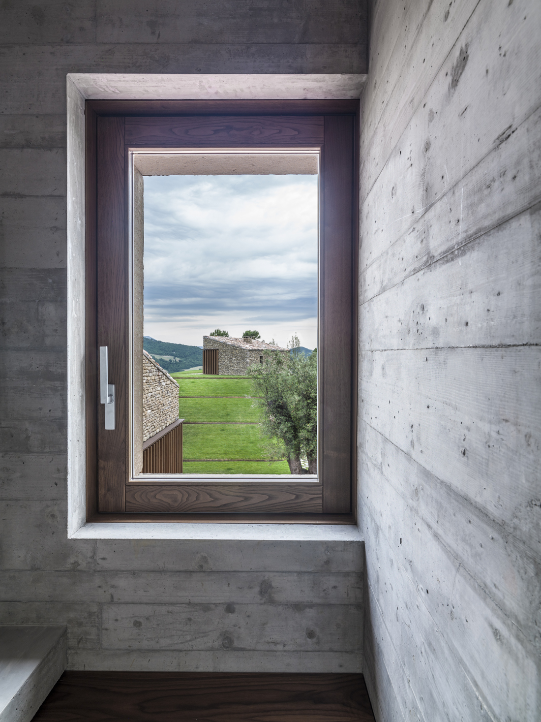 Cement Walls in a Home by GGA Architetti | DPAGES