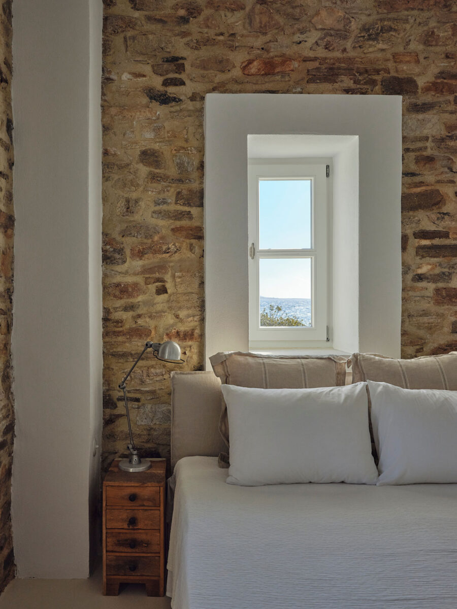 Bedroom With Stone Wall
