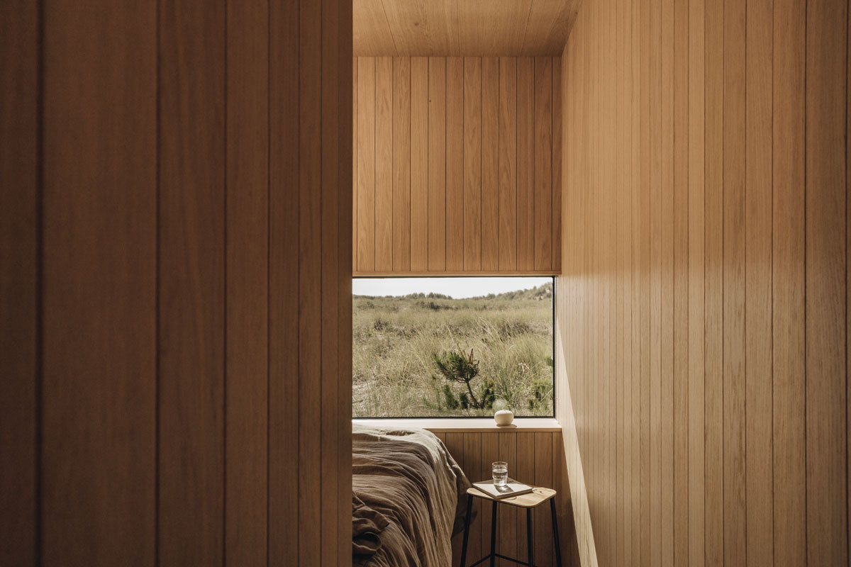 Wood paneled bedroom