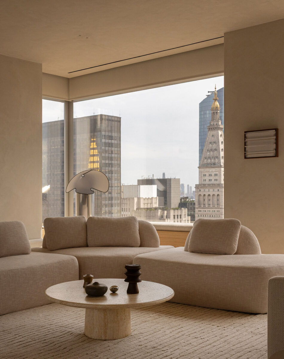 Luxury living room with neutral furniture, natural oak and floor-to-ceiling windows