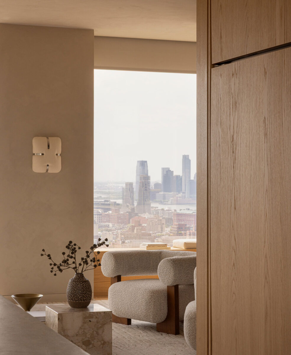 Luxury living room with neutral furniture, natural oak and large windows
