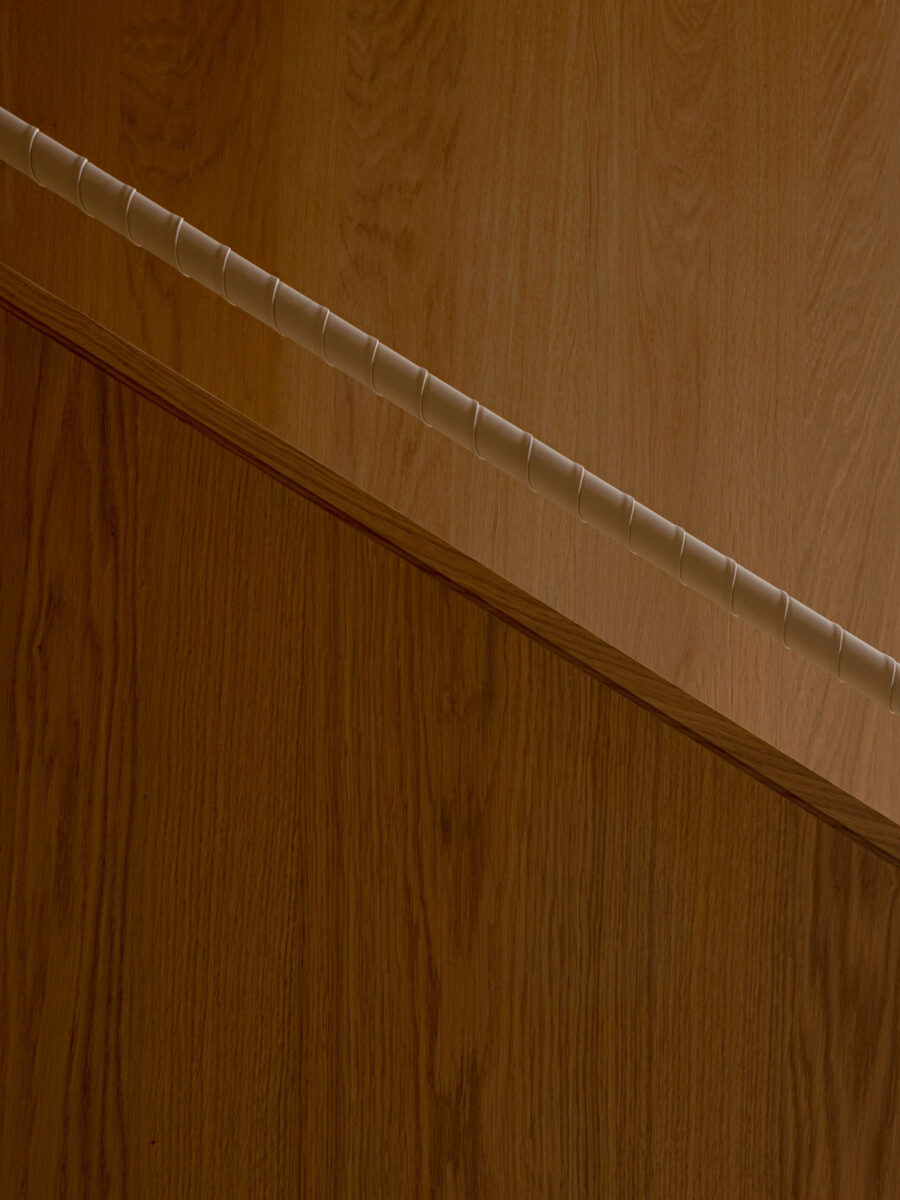 Leather wrapped staircase railing