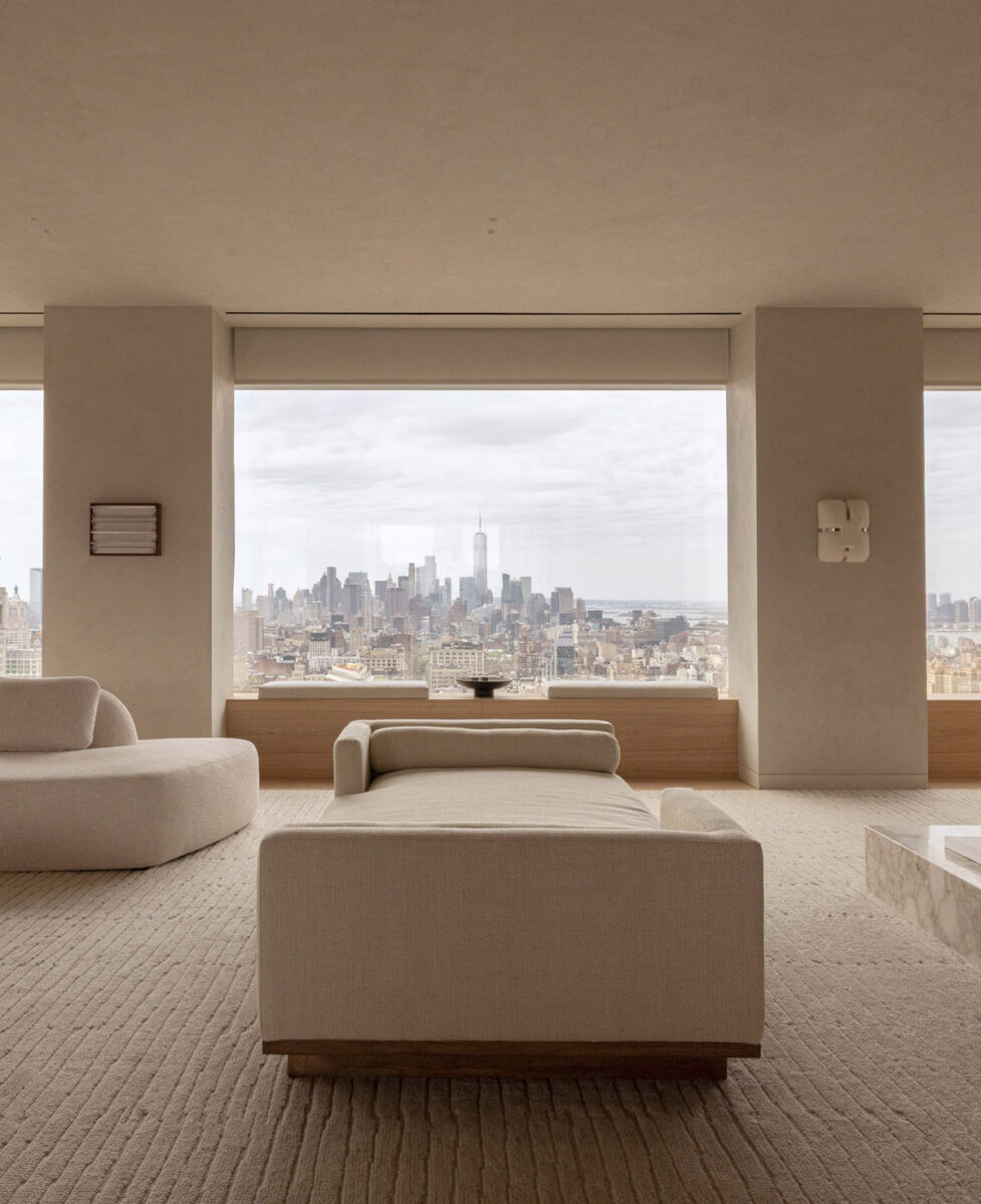 262 Fifth Avenue residence living room with large windows and Manhattan views