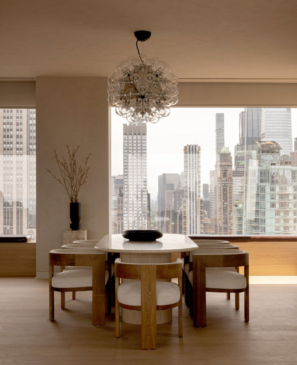Contemporary dining room with designer furniture, oak finishes and Manhattan views