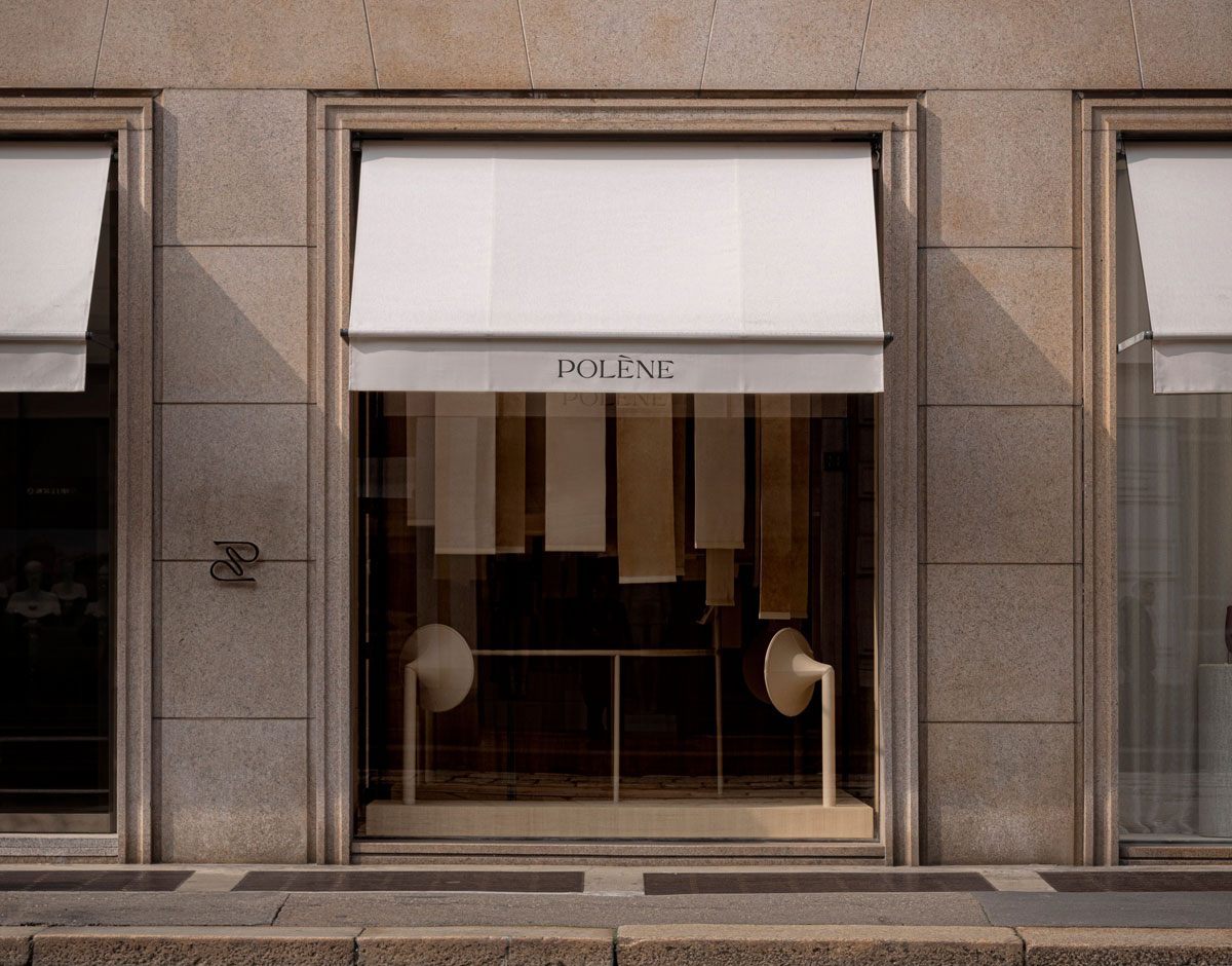 Polène’s stone-fronted Milan store beneath a white awning.