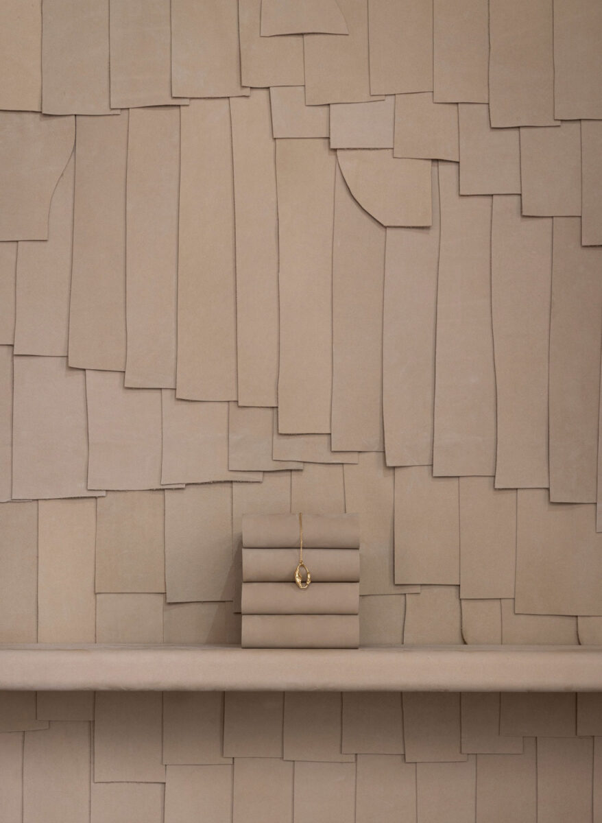 Layered leather wall treatment.