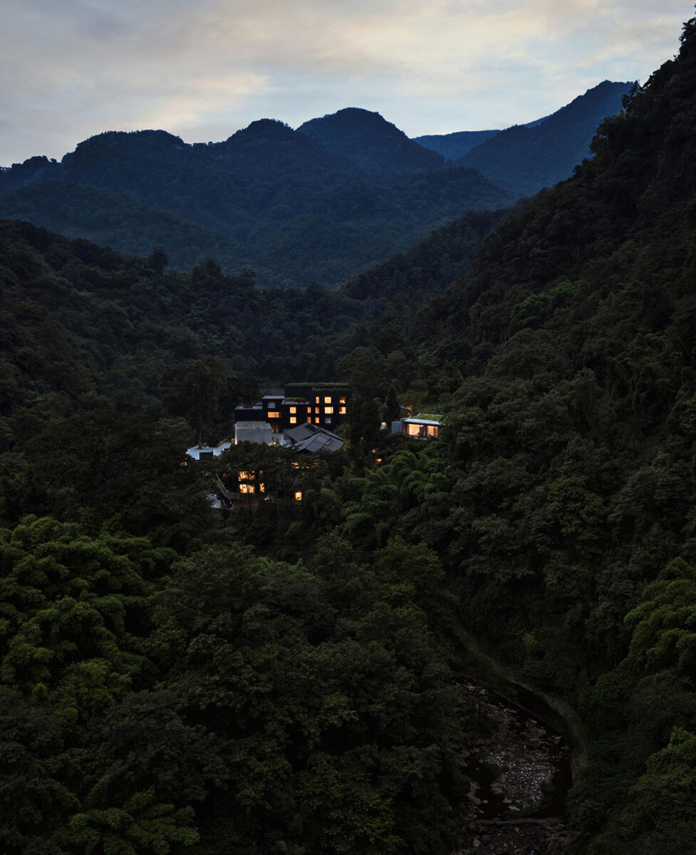 Remote luxury resort in Emeishan, China nestled in a forested mountain landscape